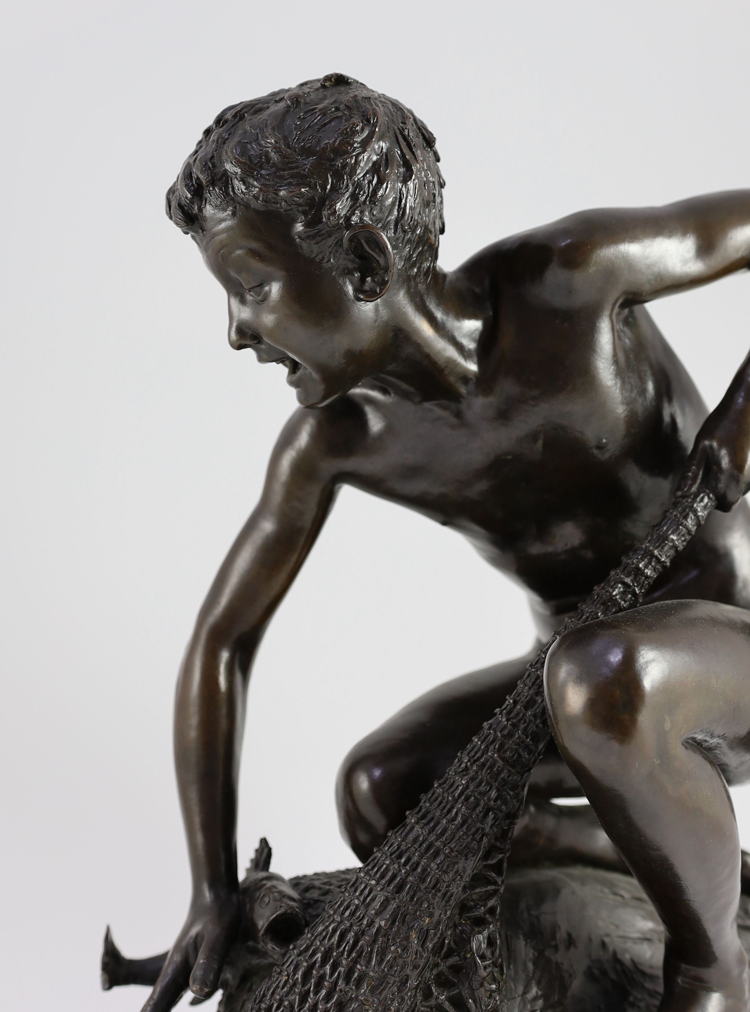 H. Gladenbeck and Son. A bronze figure of a boy catching a fish, height 45cm